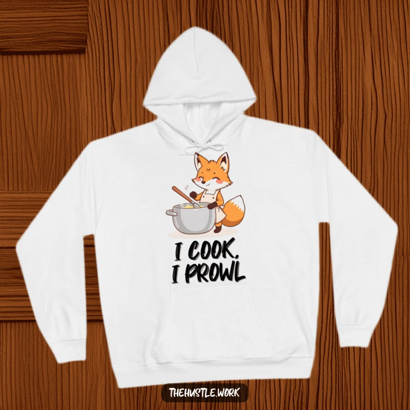 Funny fox wearing an apron, energetically stirring a large pot, printed on a soft, warm hoodie.