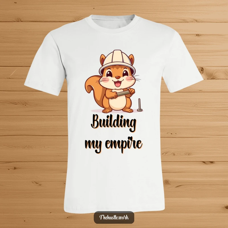 Funny t-shirt: A cheerful squirrel in a hard hat enthusiastically hammers a small nail, a humorous depiction of DIY spirit.