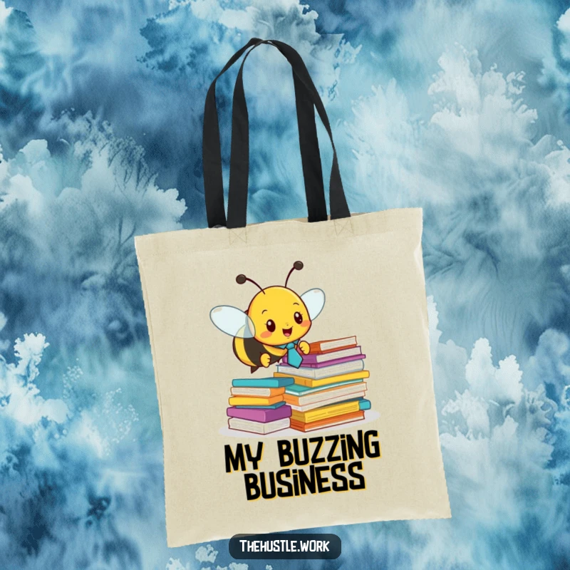 Funny tote bag: A busy bee with a tie buzzes around paper stacks, a humorous symbol of office organization.