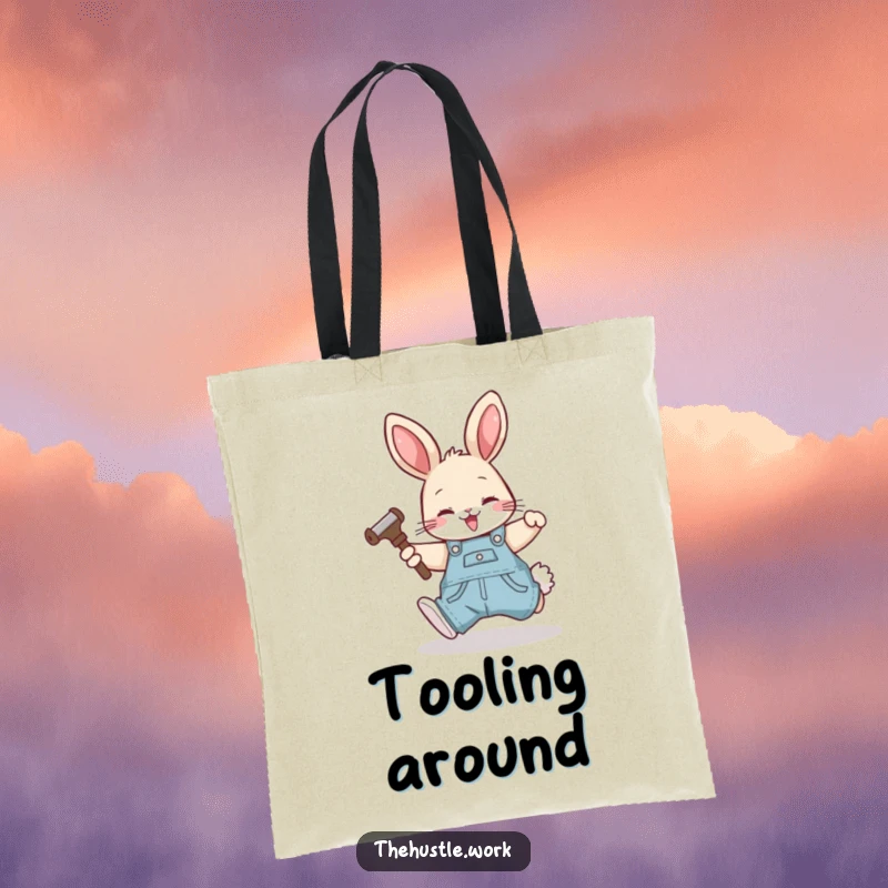 Funny rabbit wearing overalls, happily tumbling forward with a tool, on a durable and stylish tote bag.